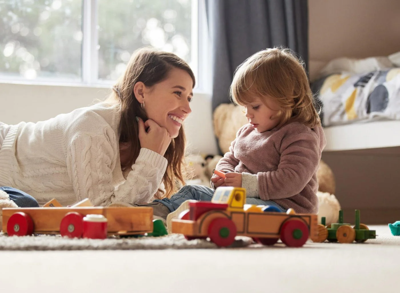 Mother and child playing together at home